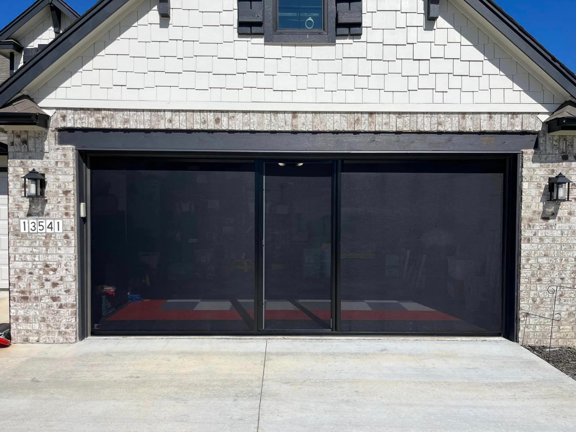 Lifestyle garage screen installation on a SW Florida home