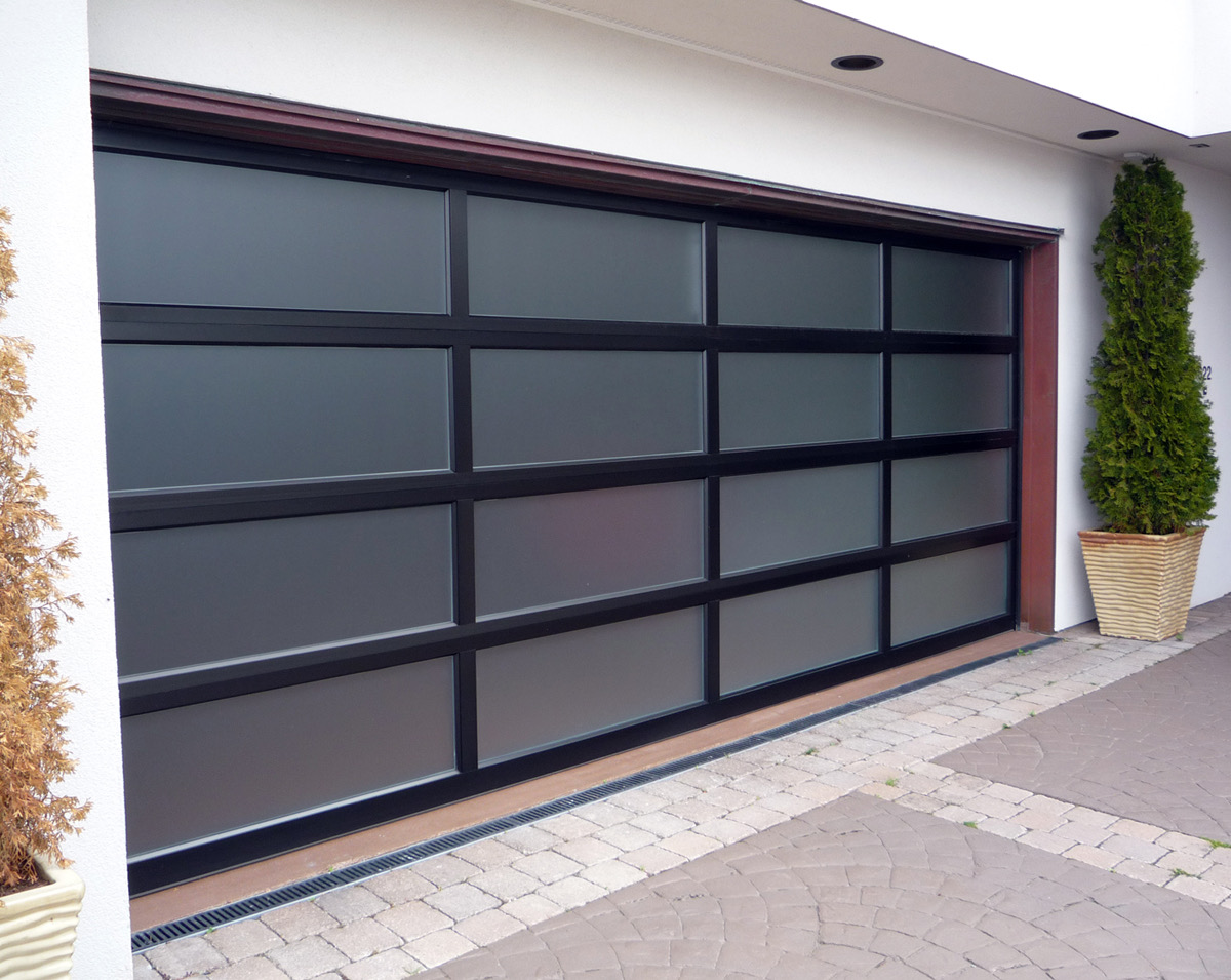 Modern glass-panel garage door installed in SW Florida